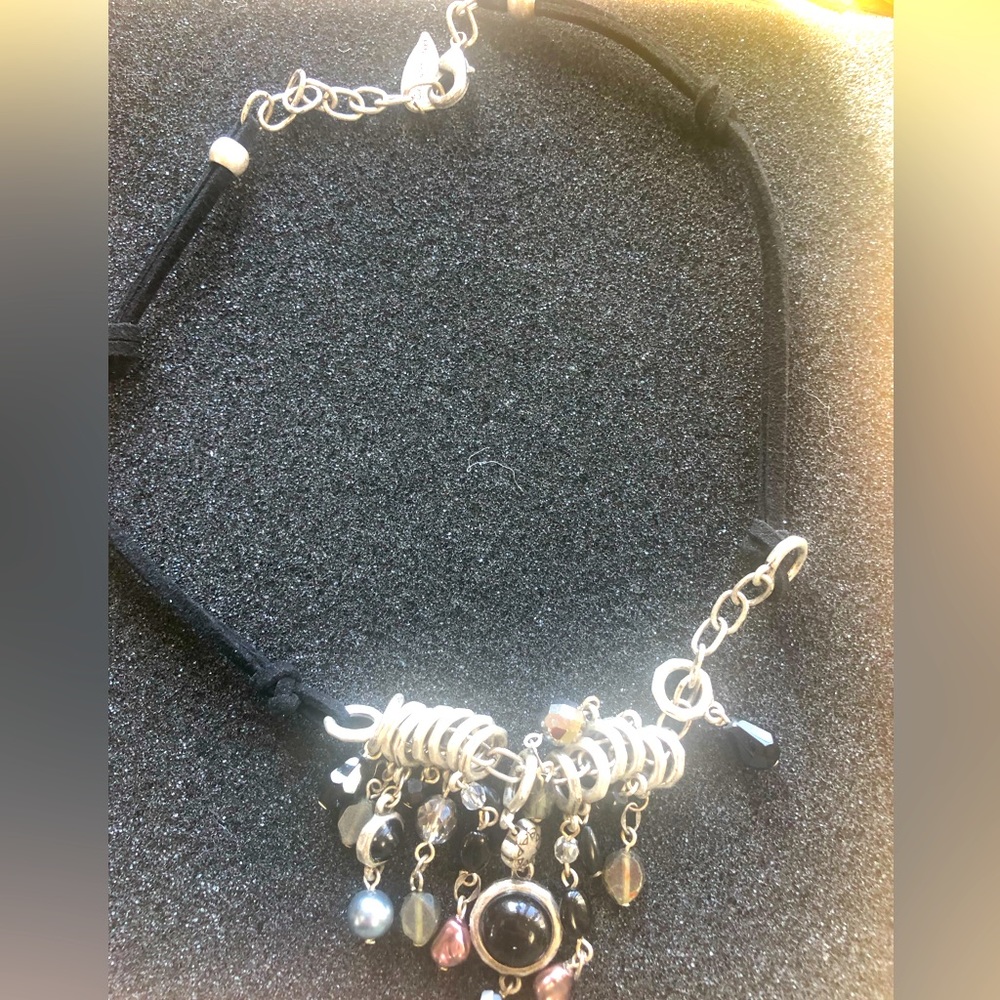 Fashion beaded necklace on black suede cord . Great accent piece